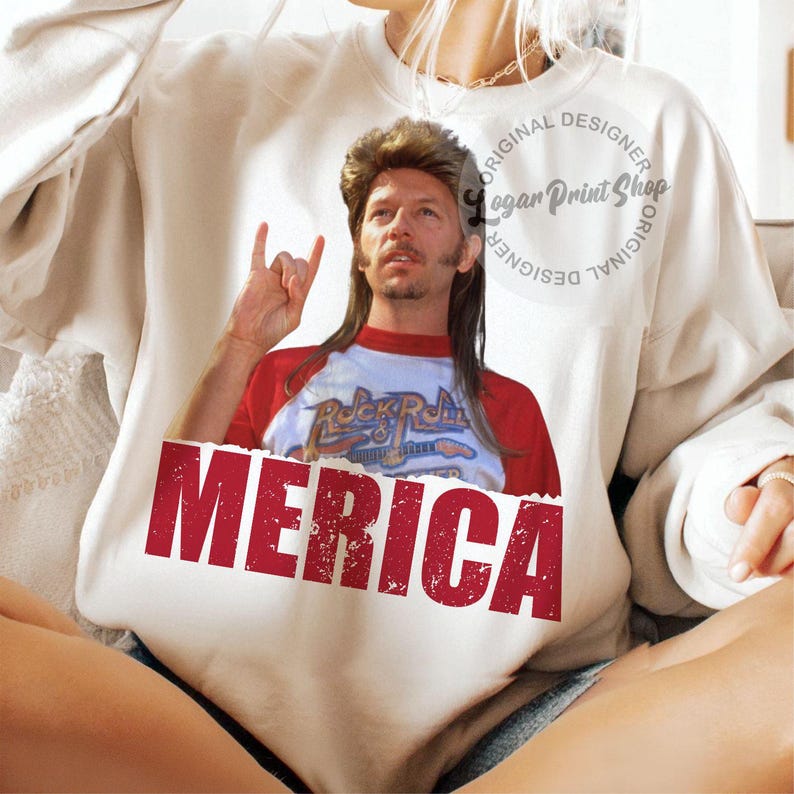 May include: White sweatshirt featuring a red, white and blue graphic of a man with long blonde hair and a goatee. The graphic says "Rock & Roll" and "Merica".