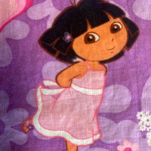 Dora the explorer  quilt cotton Bty