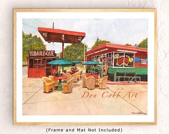 May include: A watercolor painting of a red and white building with a sign that reads "Big Barbeque". There are tables and chairs set up outside the building, and people are sitting at the tables. The painting is signed "Don Cobb Art".