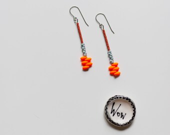 hot kiss earrings--pale blue/burnt sienna/neon orange--clashing glass beaded earrings by budpnq