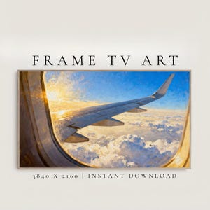 May include: A framed digital art print featuring an airplane wing viewed from a window, set against a backdrop of a bright blue sky and fluffy white clouds. The text "FRAME TV ART" is at the top, with "3840 X 2160 | INSTANT DOWNLOAD" at the bottom.