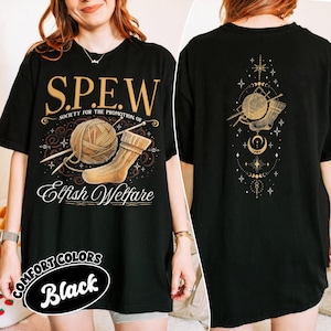 May include: Black t-shirt with a gold graphic on the front and back. The front design features a yarn ball, needles, and a sock with the text "S.P.E.W. Society for the Promotion of Elfish Welfare." The back has a similar design.