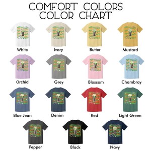 May include: A colour chart showing t-shirts in a range of colours, such as white, ivory, butter, and mustard. Each shirt has a beer glass graphic with text. The chart also includes colours like orchid, grey, blossom, chambray, blue jean, denim, red, light green, pepper, black, and navy.