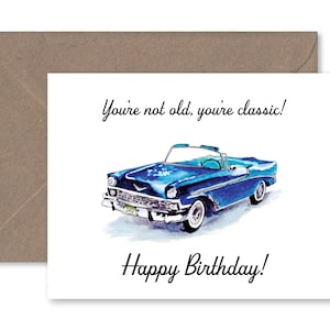 May include: A birthday card with a blue vintage car illustration and the text "You're not old, you're classic! Happy Birthday!"