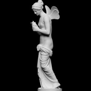 May include: A white marble statue of a woman with butterfly wings, holding a small urn. The figure is draped in fabric and stands on a pedestal against a black background. The statue is a classical art piece.