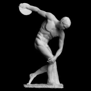 May include: A white sculpture of a nude male figure in the act of throwing a discus. The figure is captured mid-motion, with one arm extended and holding the discus, and the other arm bent. The sculpture is set against a black background.