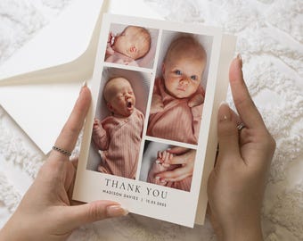 May include: Thank you card with a white background and a photo collage of a baby. The photos show the baby sleeping, smiling, and holding a hand. The text "Thank You" is printed in black at the bottom of the card, along with the baby's name and birthdate.