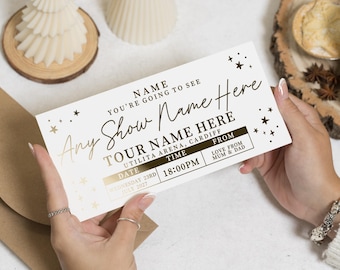 May include: A white and gold ticket with the text "Any Show Name Here" and "Tour Name Here". The ticket includes the date, time, and location. The text "Love from Mum & Dad" is also present.