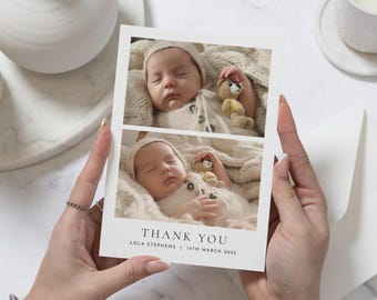 May include: Thank you card with two photos of a baby sleeping. The baby is wearing a white knitted outfit and holding a small stuffed animal. The card says "Thank You" with the baby's name and birthdate.