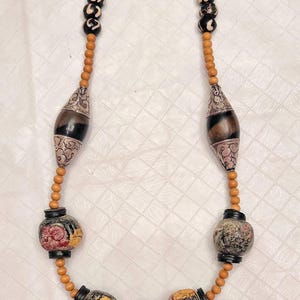 Handmade 10” necklace Buddha prayer beads, sandalwood, batik bone, and Tibetan silver tipped bone beads