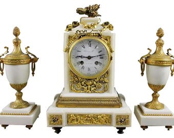 Magnífico reloj de 3 piezas del famoso RAINGO FRERES con 2 candelabros, década de 1860