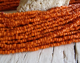 MINI orange seed beads, orange glass bead, opaque delicate spacer tube barre, irregular shape Indonesian 1 to 2mm (44 inches strand) 24ab1-5