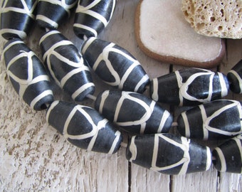 black lampwork tube glass beads, ethnic patterned,  Indonesia 11.5mm to 13mm dia x 24.5mm to 29mm long (4 beads) 22ab19-14