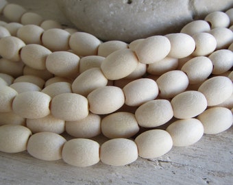 white wood oval wood beads, white bleached  tone, matte finished, 8mm to 10mm x  7mm diameter (30 inches strand) 20ab49