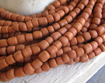 brown orange glass seed bead, matte barrel tube, small  ethnic spacer , indonesian 5 to 6.5mm dia, new indo-pacific (22 inches) 22ab14-13