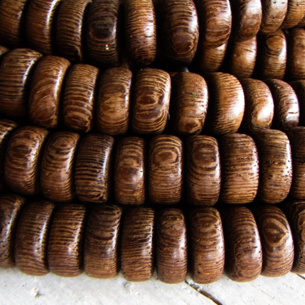 Robles brown rondelle  wood beads,  spacer finished,   10mm dia x 3.5 - 5mm wide ( 30 inches strand) 20ab38