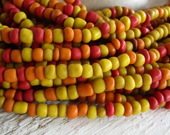 mix  glass seed beads , small barrel tube spacer, opaque yellow orange red , Indonesia 3 to 5mm dia (44 inches strand ) 21ab3-16