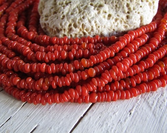 Mini tiny  red orange  rondelle lampwork glass beads, delicate, Indonesian ethnic  2.5mm to 3.5mm dia ( 22 inches strand ) 23ab1-12