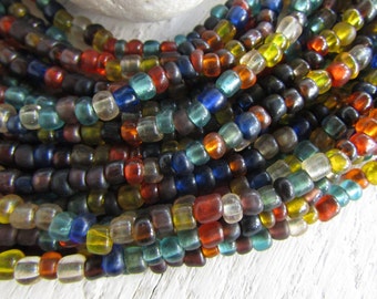 Mix seed glass beads, small transparent and matte  Irregular spacer, barrel tube,  3mm to 4mm dia (22 in strand) 8bb112-15