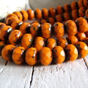 Czech glass beads, faceted rondelle,  bright orange with picasso edges 5mm x 7mm (25 beads)  24acz14