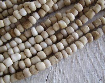 rustic beige cream glass seed beads,  opaque rondelle barrel tube  Indonesian 3mm to 5mm dia (44 inches ) 23ab4-18