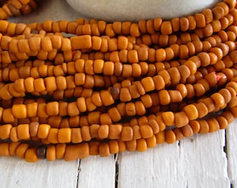 orange rustic glass seed beads , small barrel tube spacer, Indonesia 3 to 5mm dia (44 inches strand ) 24ab2-1