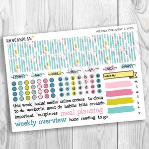 May include: A sticker sheet labeled HANCANPLAN W213 featuring a weekly overview design. It includes a pattern of light blue pencils, circular icons in blue, yellow, and pink, a yellow banner for the week, and text labels for daily tasks and planning.