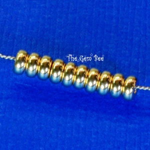 3.2mm 14k Solid Gold Smooth Donut Rondelle Bead Spacer 1.5mm Holes Quanity: (10) or (100) Made in USA