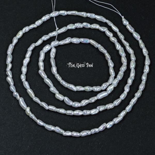 White Japanese Saltwater Keishi Pearl Center-Drilled Rice Beads 9 inch Half strand