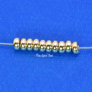 4.2mm 14k Solid Gold Smooth Donut Rondelles Beads Spacers 1.5mm Hole Size Made in USA (20mm long)