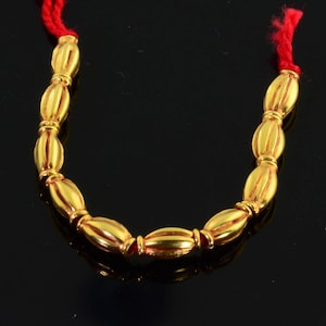 18k Solid Yellow Gold 3mmx6.2mm Rice Spacer Findings Beads Quantity : 2.5 inch strand (10) or (2)