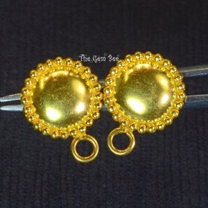 Una coppia di risultati di ganci per orecchini in oro 18 carati autentici  per perle semiforate