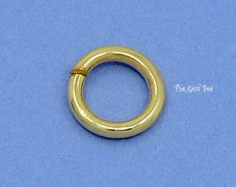 Anello aperto in oro giallo massiccio 14 carati, spessore 5,25 mm (calibro 19). Quantità: 1 pezzo o 5 pezzi.