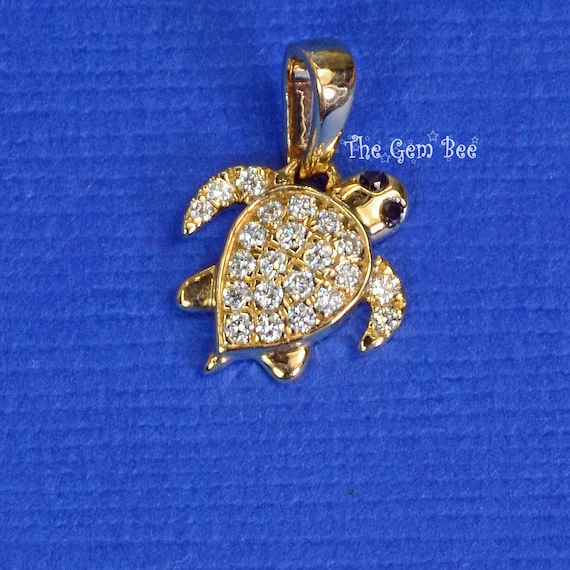 Gold sea turtle pendant deals