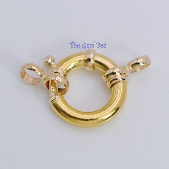 Anello con bullone a molla di design italiano in oro giallo