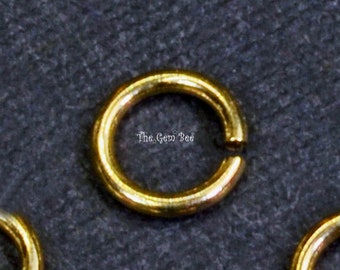 Anillo de salto abierto de oro amarillo macizo de 14 k, calibre 22, 4 mm. Cantidad: (1), (5) o (10).