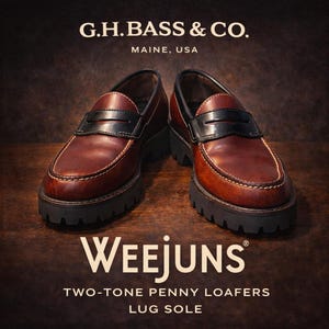 May include: A pair of two-tone penny loafers with lug soles. The shoes are brown leather with black accents and stitching. The brand name "WEEJUNS" is displayed below the shoes, with "G.H. BASS & CO." and "MAINE, USA" above.