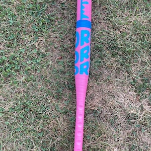 May include: A pink baseball bat with a blue "ERROR" graphic printed on the side.