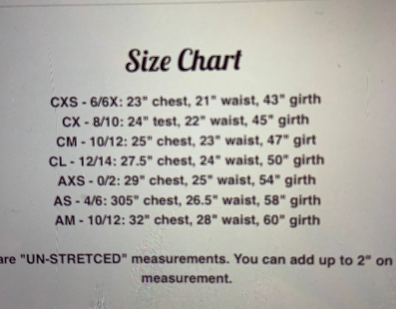 May include: Size chart for clothing with measurements in inches for chest, waist, and girth. The chart includes sizes for children and adults. The text states that the measurements are "UN-STRETCED" and that you can add up to 2 inches to the measurement.