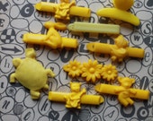 nostalgia in yellow - vintage plastic barrettes from the 1980s