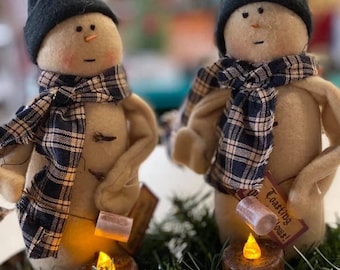Primitive snowman Toasting Marshmallows