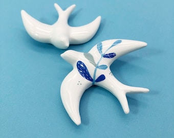 Two ceramic mini swallow - One illustrated with leaves in blue one in white - wall Decor -  handcrafted