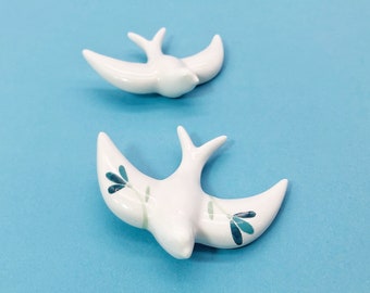 Two mini swallow ceramic- One illustrated with leaves in blue one in white - wall Decor -  handcrafted