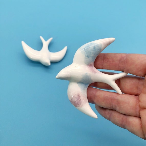 Two mini swallows, one illustrated, one white - ceramic- Tie dye- watercolor-  Individual and Unique Design in blue/pink  - wall Decor.