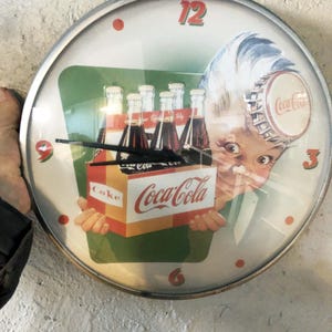 Vintage Coca-Cola wall clock, Coca-Cola icon, advertising, vintage furniture, Coca-Cola illustration, vintage Coca-Cola bottles