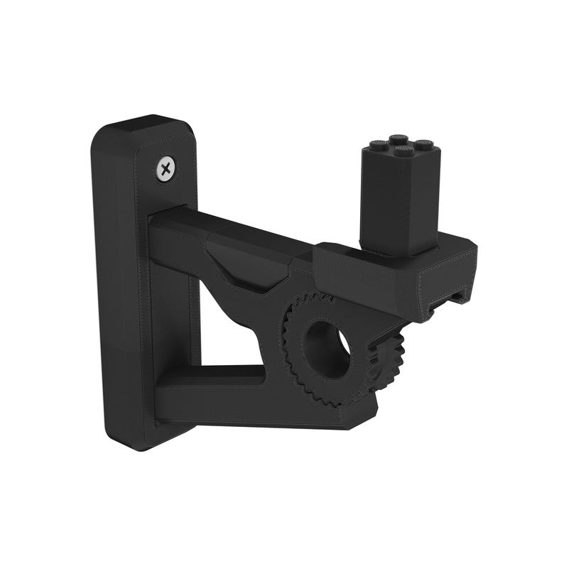 May include: Black wall mount with a gear-shaped bracket and a small rectangular platform. The mount is designed to hold a guitar or other instrument.