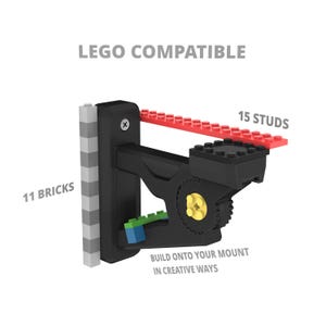 May include: Black LEGO compatible mount with a 15 stud plate, 11 brick height, and a gear for building onto in creative ways. LEGO is a registered trademark of the LEGO Group.