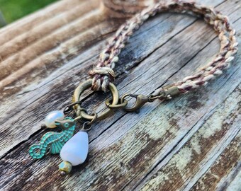 Hand Twisted and Waxed Cord Bracelet with Hawaiian Cone Snail Shell  Seahorse and  Freshwater Pearl Charms Brass Wire Wrapped