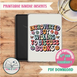 May include: A Kindle Paperwhite case with a colourful design that reads "Introverted but willing to discuss books." The case is white with a black border and features floral and butterfly accents. The text "Printable Kindle Inserts" is at the top.