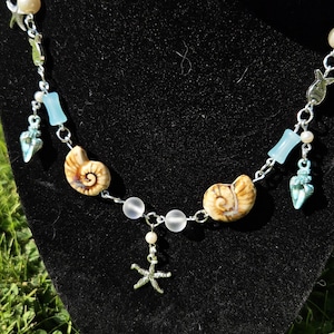 Collar de estrella de mar y concha